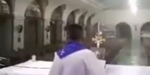 While a typhoon raged, this priest continued his Mass