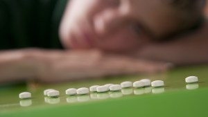 Teen lines up pills