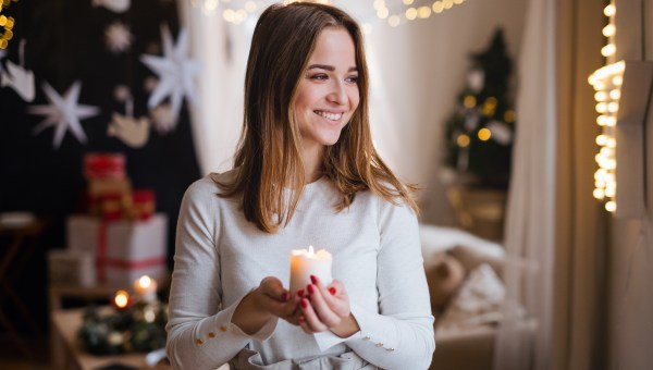 woman Christmas candle